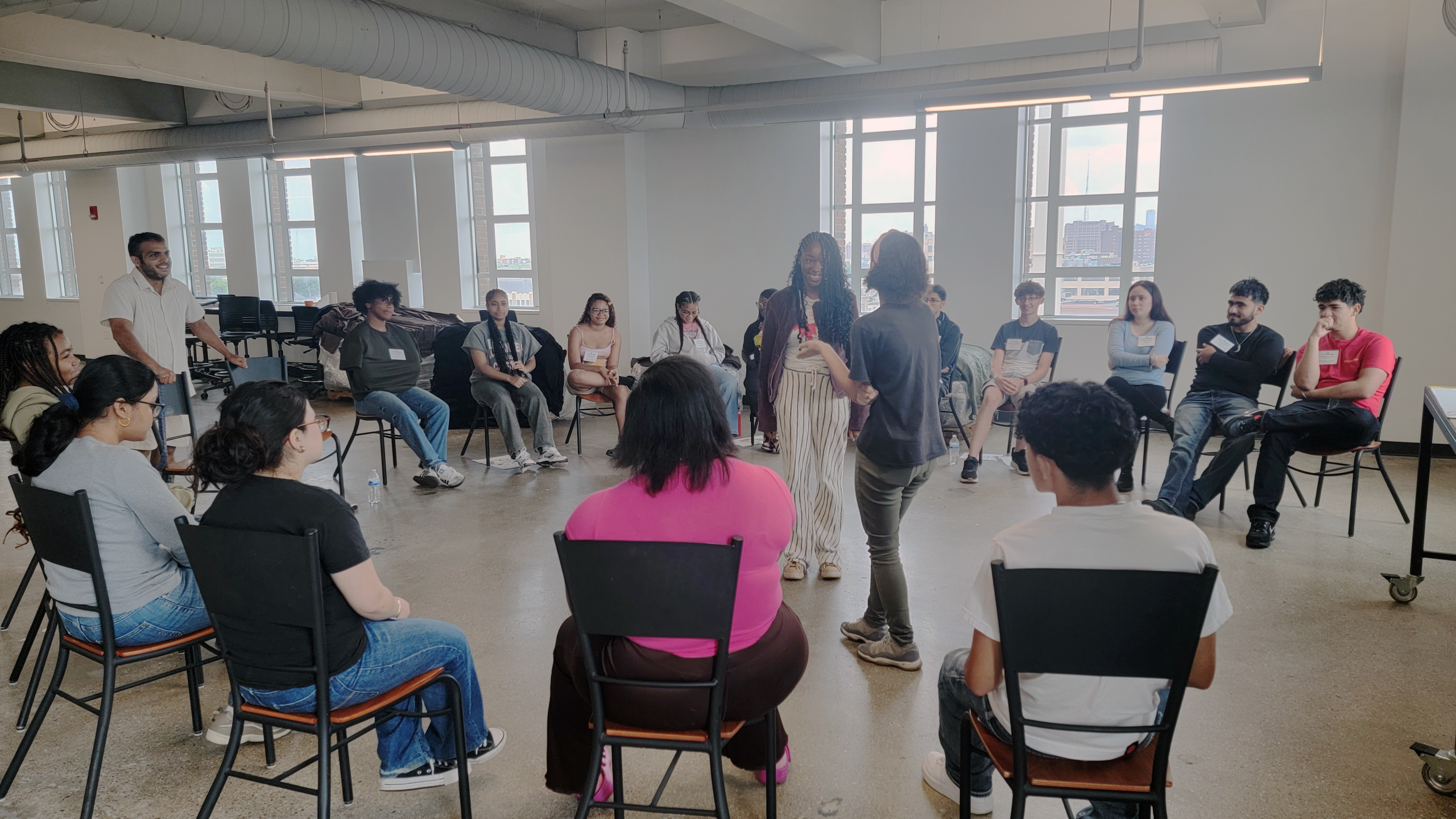 BAI Interns in a circle at Curriculum Day